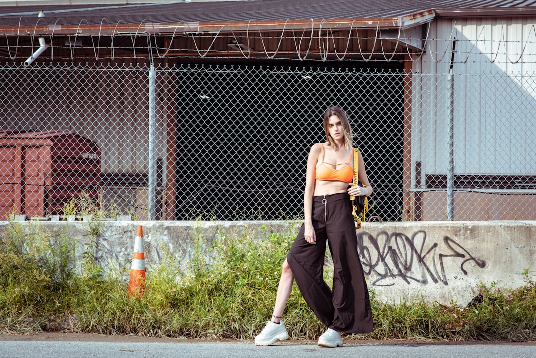 Woman in satin trousers